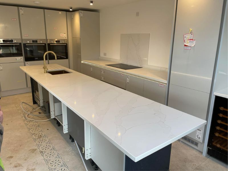Large Marble kitchen island with sink